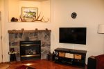Living Room with Gas Fireplace and TV